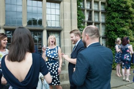 Guests looking amazed at Chris' tricks