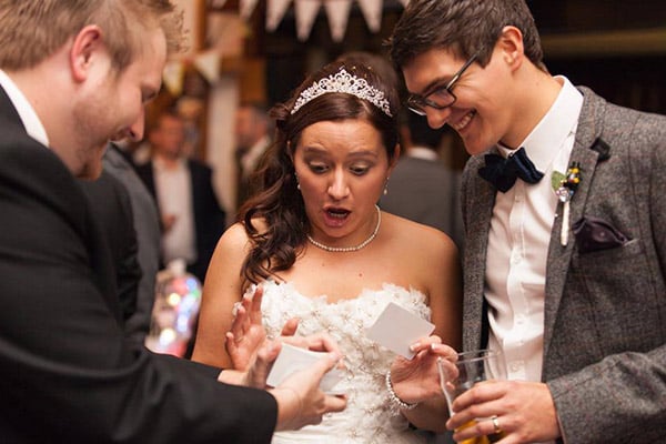 Chris performing wedding magic for the bride and groom