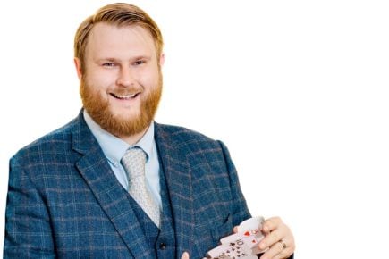 Close up magician with cards
