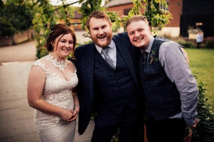 Chris Whitelock with the bride and groom at their wedding