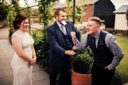 Chris whitelock performing magic tricks at a wedding