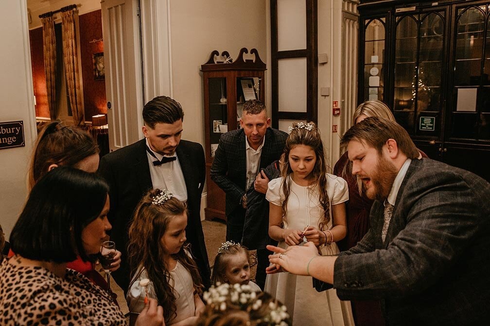 Wedding Magician Christopher Whitelock with Bride and Groom