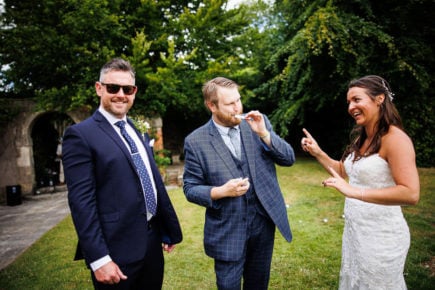 Wedding Magician Christopher Whitelock with Bride and Groom