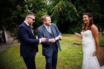 Wedding Magician Christopher Whitelock with Bride and Groom