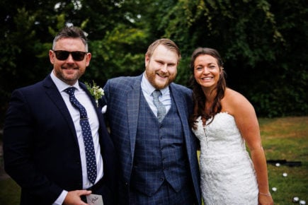 Wedding Magician Christopher Whitelock with Bride and Groom