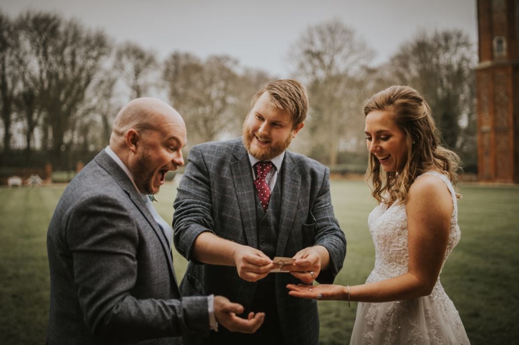 Christopher Whitelock performing magic to bride and groom