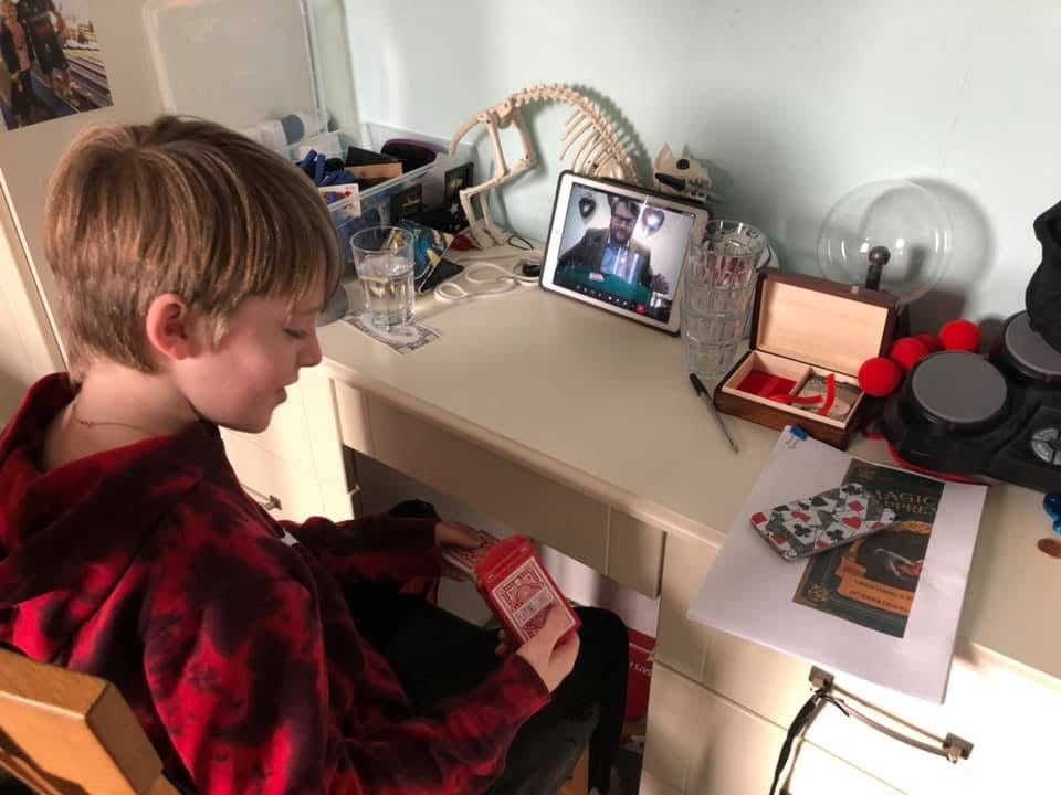 virtual magician giving a magic lesson online